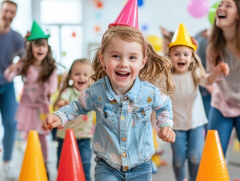 Happy Kids Running Obstacle Course at Birthday Party with Cones and Tunnels