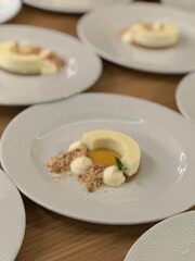 Yellow cake nicely decorated on a white plate.