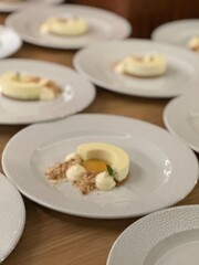 Yellow cake nicely decorated on a white plate.