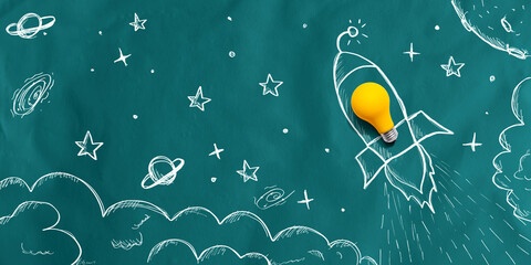 Idea light bulb rocket flying to the sky - Flat lay