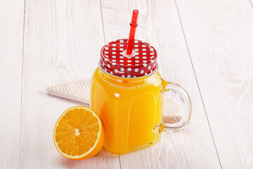 Sweet fresh orange juice in the glass