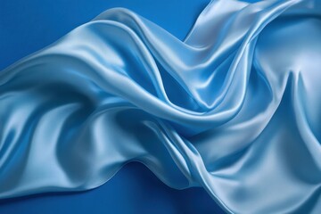 Obraz premium Elegant azure satin fabric flowing softly on a blue background
