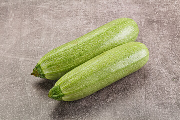 Raw green ripe zucchini vegetable