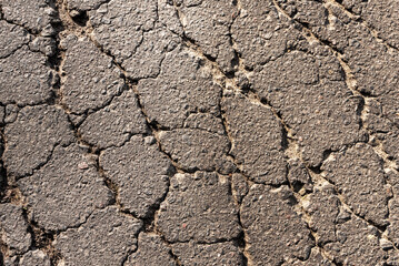 Cracked asphalt texture. Top view. Asphalt. Road background