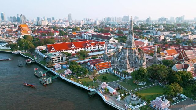 Aerial view sunset wat arun situated on the west bank of the Chao Phraya River. sightseeing travel Bangkok Thailand