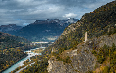 view of the Rhine River in the Domleschg Valley and the Hochjuvalt fortress