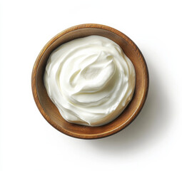 Creamy and smooth yogurt in wooden bowl, perfect for healthy snacks or cooking. This versatile dairy product adds richness to various dishes
