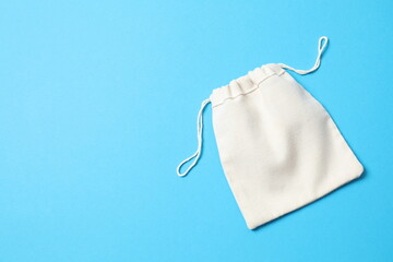 Small eco sack on color background. Top view.