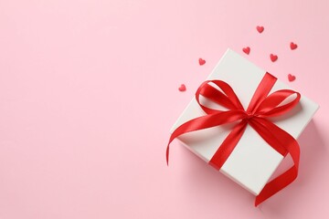 Beautiful gift box on color background