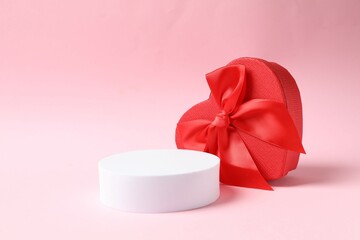 Beautiful gift with podium on a colored background