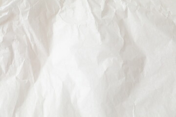 Obraz premium White crumpled paper texture background.