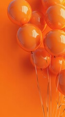 Bright Orange Balloons on an Orange Background