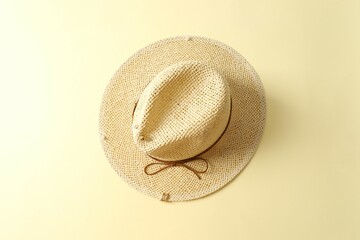 Straw hat on colored background