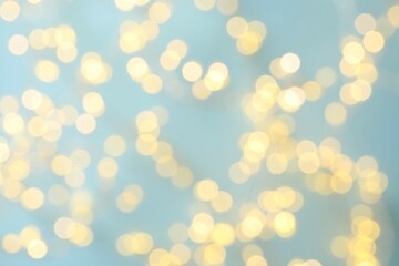 Golden blurred bokeh lights on color background. Glitter sparkle stars for celebrate. Overlay for your design