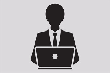 Silhouette of a person sitting behind a laptop.