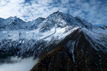 Obraz premium Aerial view of beautiful snow capped mountains landscape