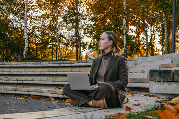 Fototapeta premium Work,Remotely work.freelancer works remotely nature,cozy workation, remote work,leisure, work life balance,digital nomad, workation,work travel,remotely work.Travelling.Work vacation remotely
