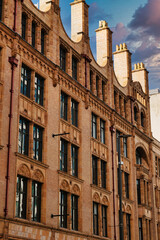Brick Building with Ornate Detailing and Chimneys