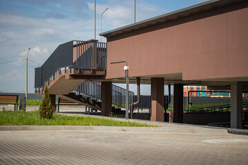 Modern residential building featuring convenient entrances and passages designed for enhanced...