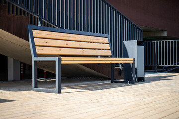 Modern residential area featuring benches for relaxation and community interaction in a...