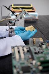 Technicians meticulously repair electronic components to turn them into precious gold. This process...