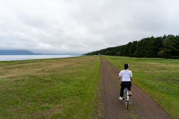 Obraz premium person riding a bicycle
