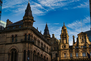 Naklejka premium Stone Buildings with Spires and Ornate Details