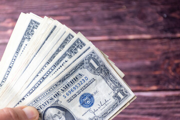 dollars in hand