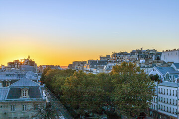 Obraz premium View from the balcony to the streets of Montmartre and roofs of buildings in Paris, France