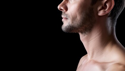 Obraz premium Close up portrait of a man on a black background