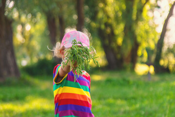 Child in ragweed flowers allergy. Selective focus.
