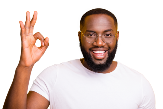 Close up photo of black man having approached camera as close as possible for you to see his ok sign better while isolated with vivid background