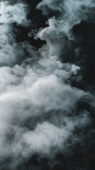 Fototapeta premium Close-up of steam or abstract white smog rising above. water droplets that can be seen that swirl beautifully from humidifier spray. Isolated on a black background