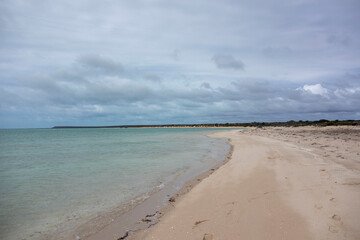 Francois Peron, Western Australia. Where the red sand meets the white sand to meet the blue ocean. Lots of birds flying and ocean life.