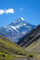 Fototapeta premium Serene Mountain Range Under a Clear Blue Sky