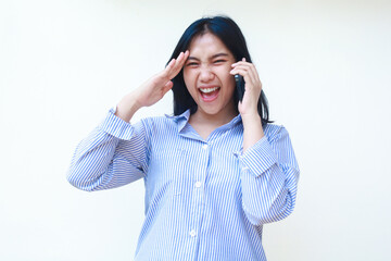 excited asian woman wearing striped shirt using smartphone screaming isolated on white background