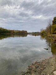 Fototapeta premium river and clouds in autumn