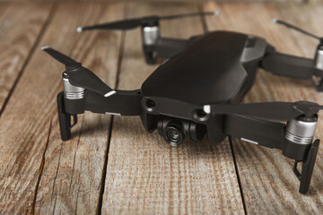 Drone unmanned aircraft on textured background. Modern FPV drone on background. The drone...