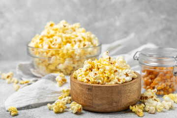 Salty popcorn on bright color background. Cinema and entertainment concept. Movie night with popcorn. Delicious appetizer, snack.Space for text, copy space. Banner