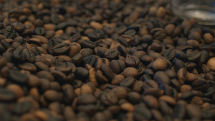 Roasted coffee beans texture background. Top view. Close up.
