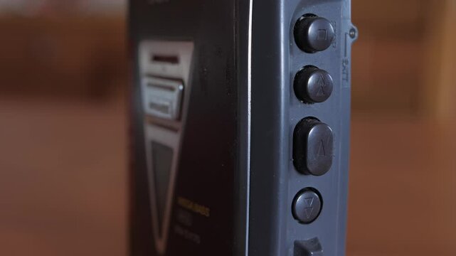 press stop on a Walkman cassette player 4k