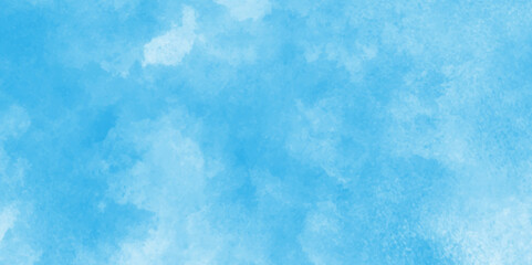 Obraz premium Abstract Blue Watercolor Background,Creative and painted cloudy sky blue watercolor background,Colorful gradient ink colors wet effect hand drawn canvas background wallpaper.