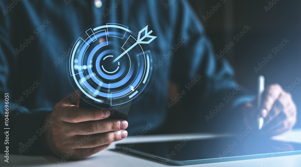 Poster man hand using smartphone, glowing dartboard icon with arrow