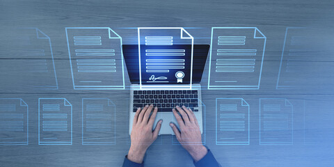 Man typing on laptop, glowing electronic document files and digital signature