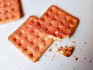 Biscuits flavoured with abon sapi or shredded beef, namely dried beef flakes, isolated on a white background.with batter crumbles 