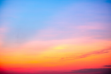 Fototapeta premium Beautiful , luxury soft gradient orange gold clouds and sunlight on the blue sky perfect for the background, take in everning,Twilight, Large size, high definition landscape photo