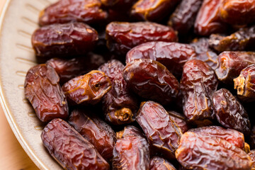 Dried date fruits in a pile