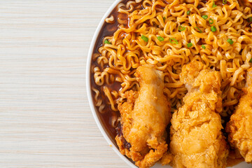 Korean instant noodles with fried chicken or Fried chicken ramyeon
