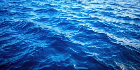 Obraz premium An Abstract View of the Ocean's Depth, Capturing the Subtle Movements of Gentle Waves and the Vivid Shade of Blue