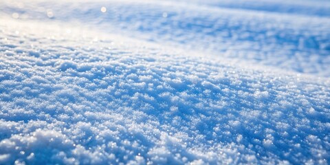 Obraz premium Close-up view of freshly fallen snow, glistening with light and showcasing the intricate beauty of individual snowflakes, creating a soft and delicate surface.